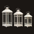 Three white lanterns of different sizes on a white background
